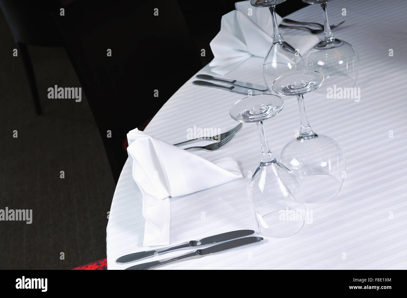 table with empty glasses in luxury restaurant Stock Photo - Alamy