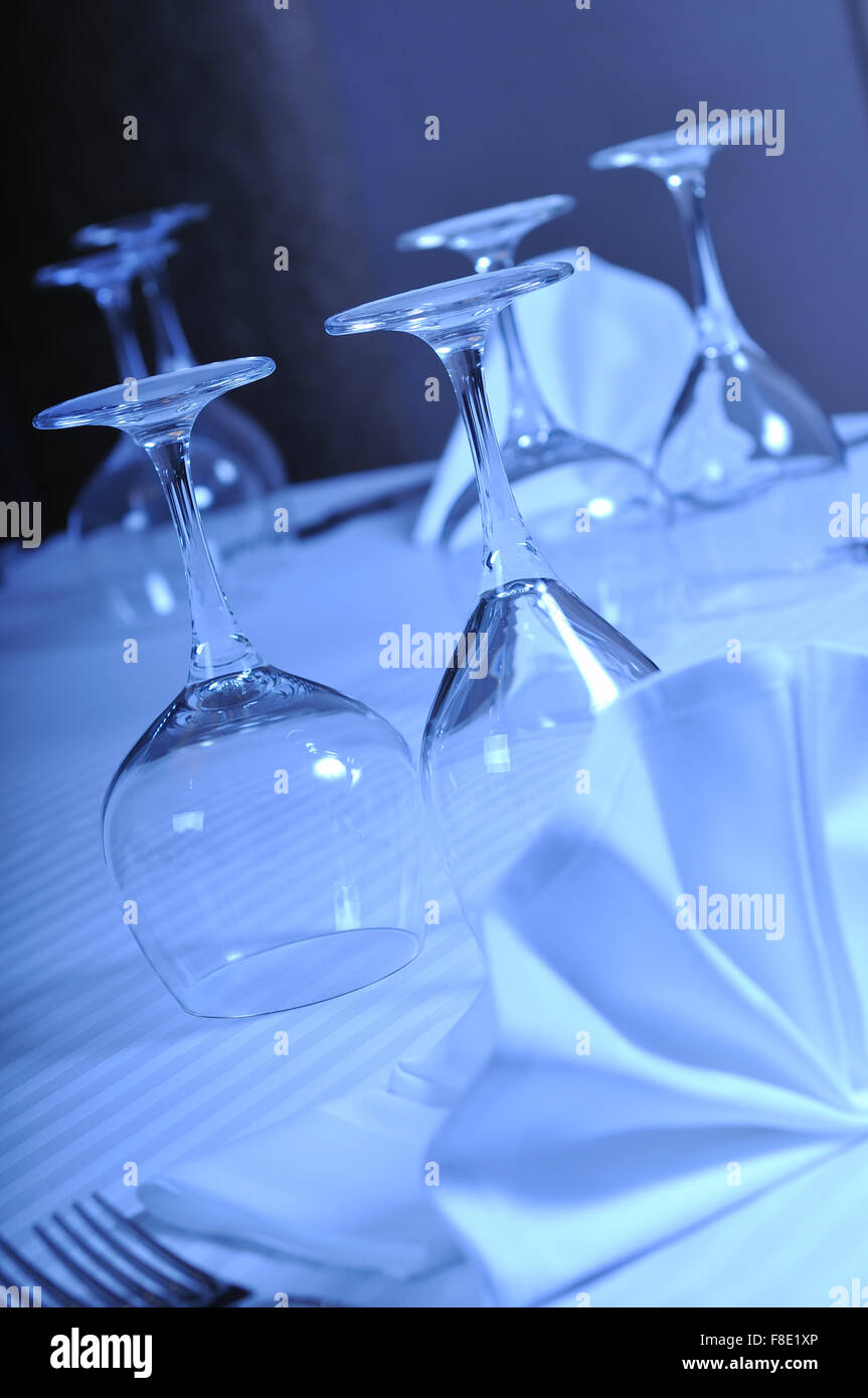 table with empty glasses in luxury restaurant Stock Photo - Alamy