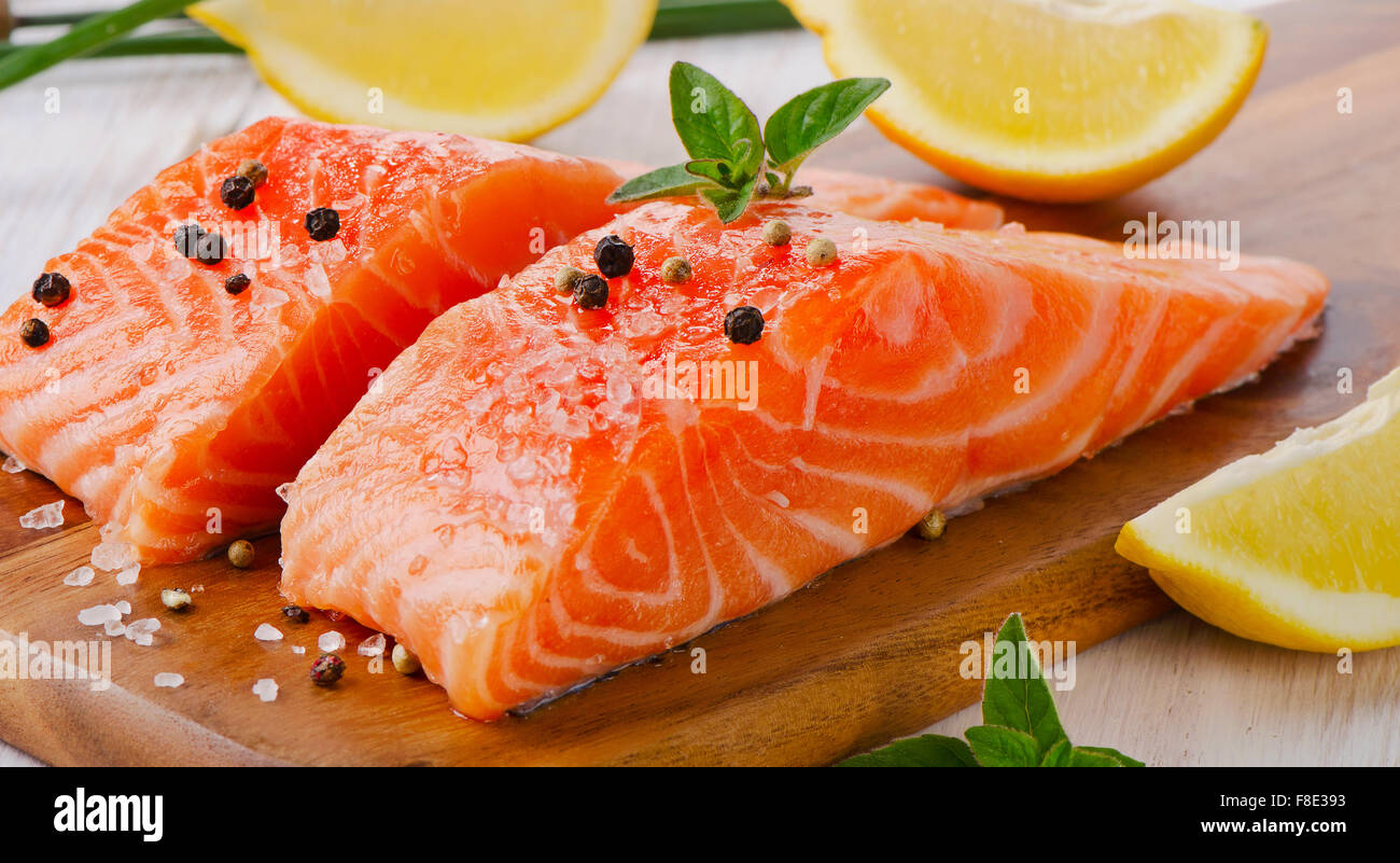 Salmon on a wooden board . Selective focus Stock Photo