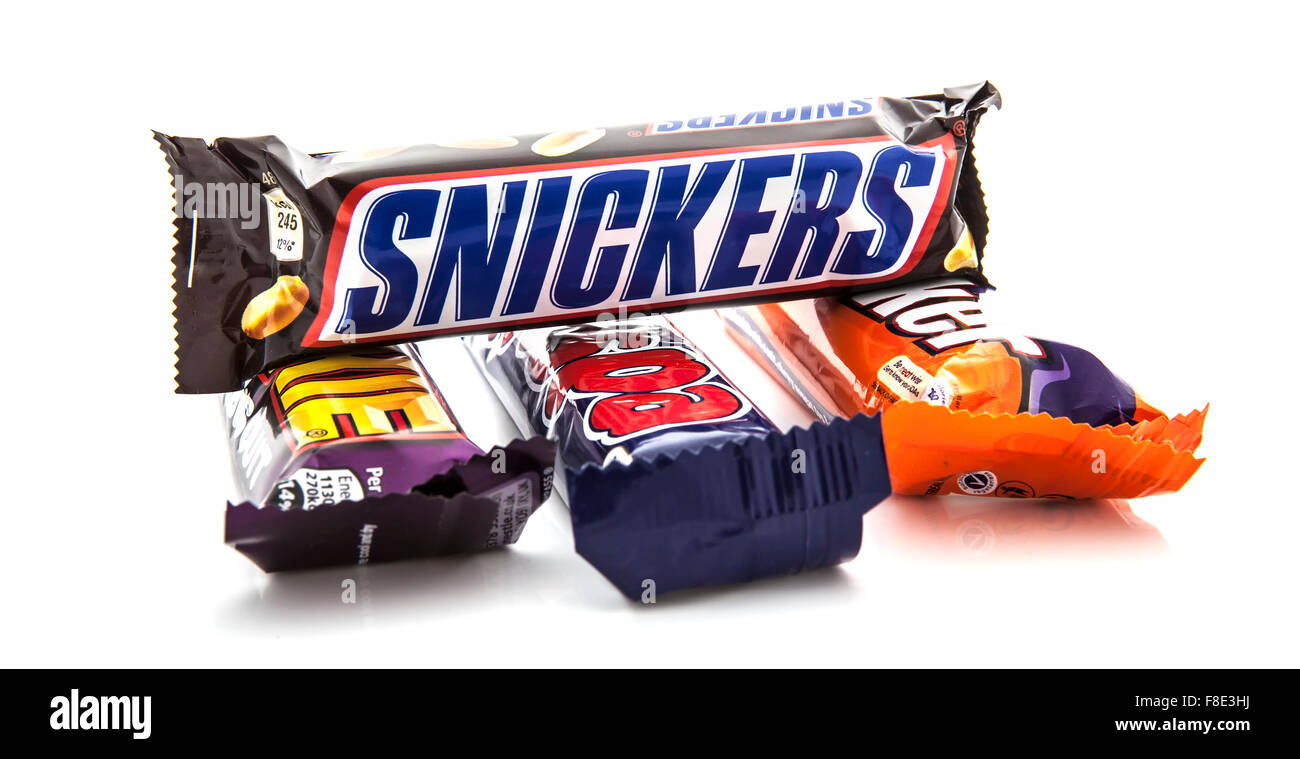 Snickers chocolate bar on a Yorkie, Wispa, and Double Decker over a white background Stock Photo