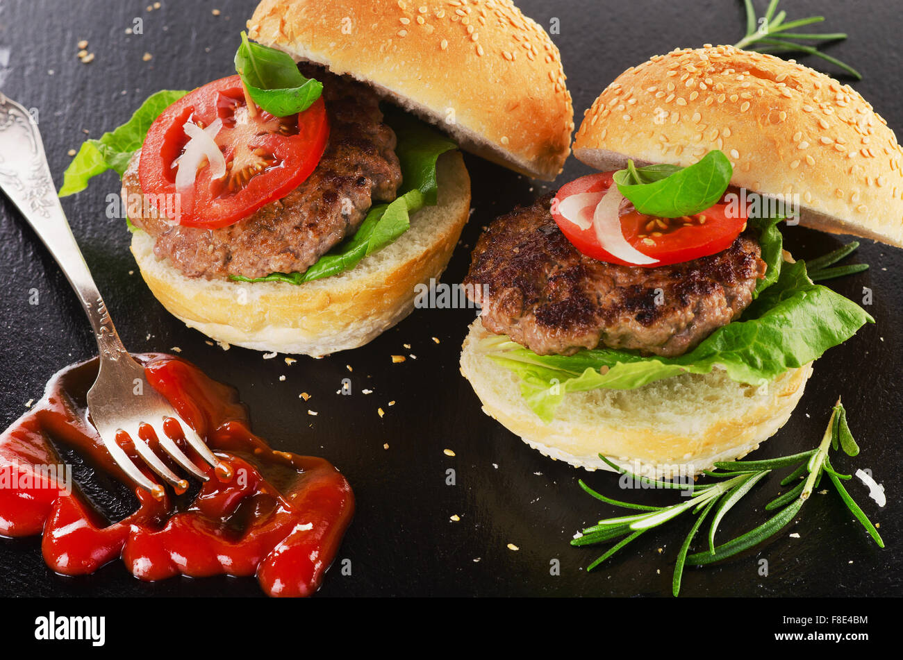 Homemade burger on dark background. Selective focus Stock Photo