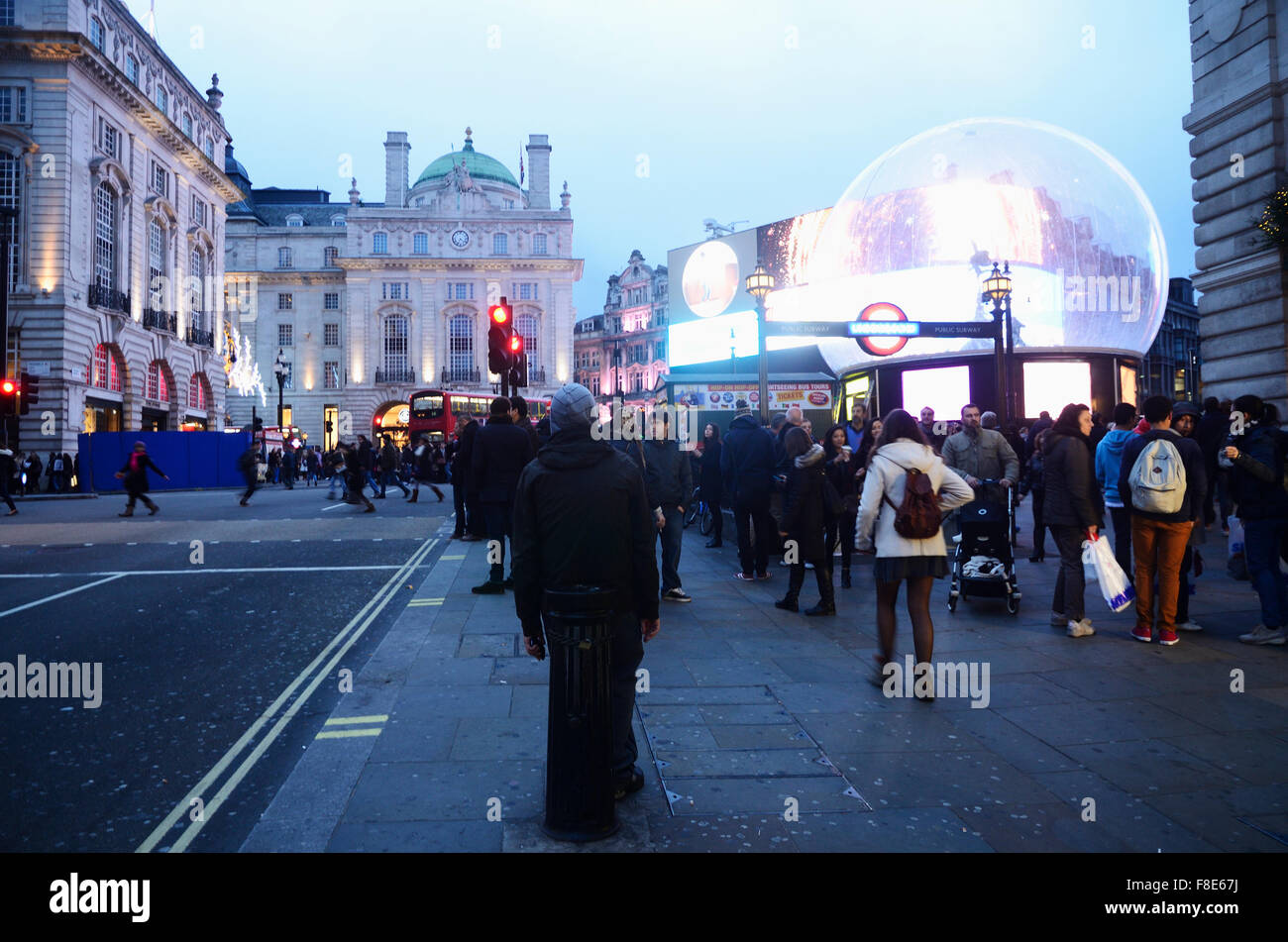 People and traffic in Picadilly Circus, Famous public space in London's West End. London, England, United Kingdom Stock Photo
