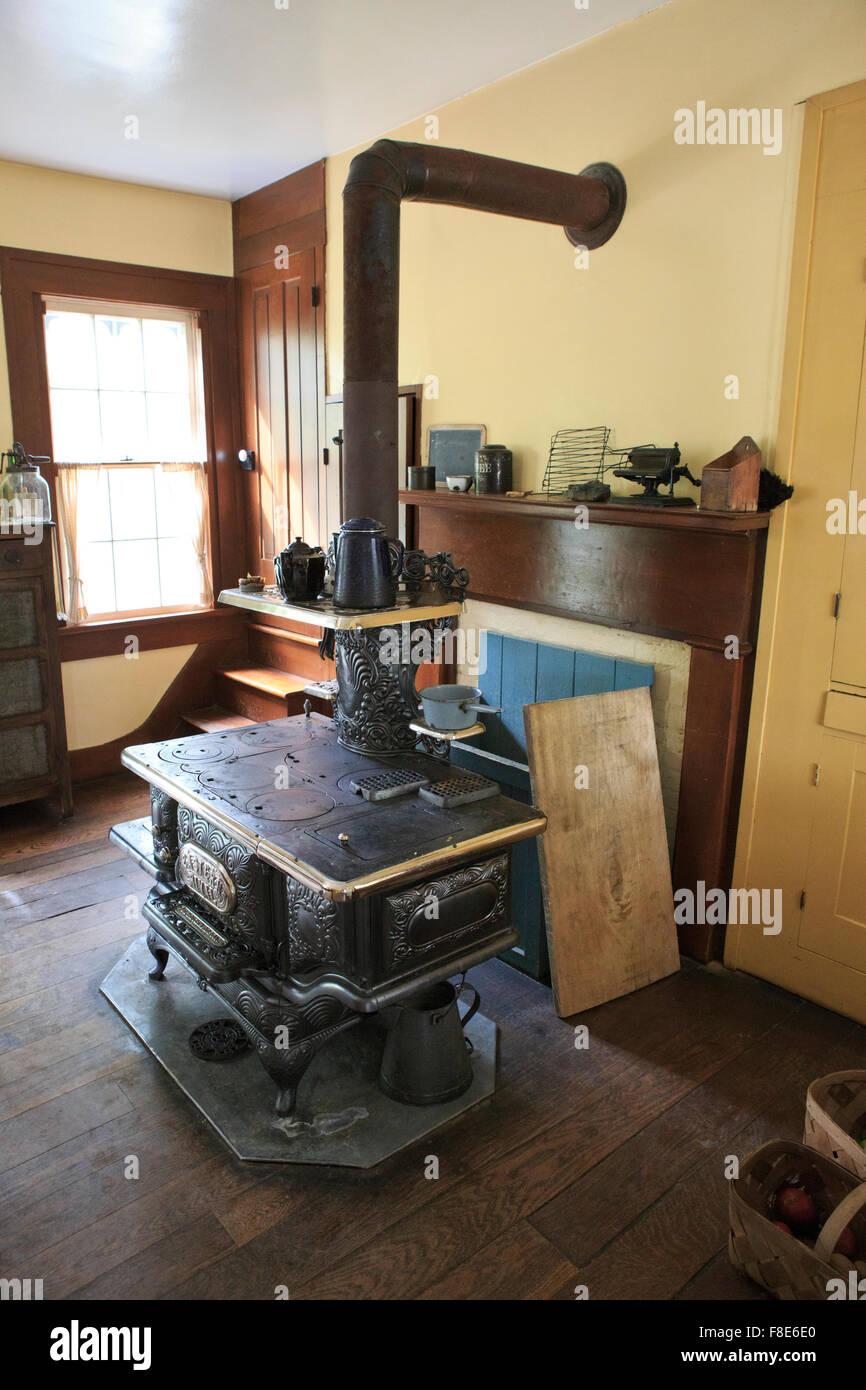 Cast iron heating stove in old farmhouse Stock Photo Alamy