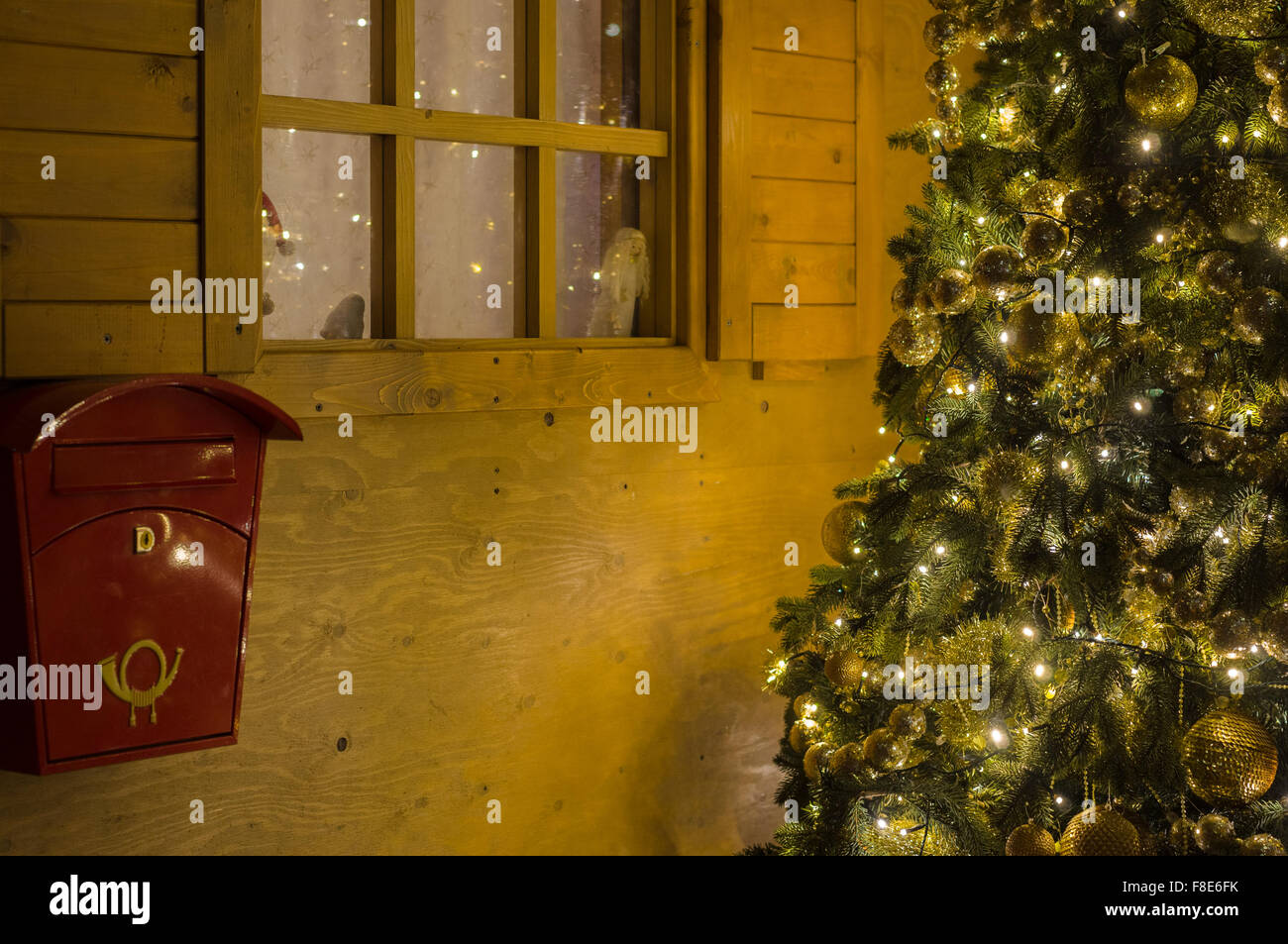 Santa Claus house with letterbox and decorated Christmas tree Stock