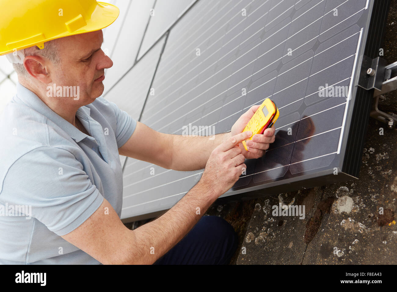 Engineer Installing Solar Panels On Roof Of House Stock Photo Alamy