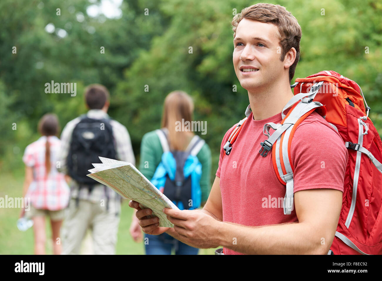 Group Of Young Friends Hiking In the Countryside Stock Photo - Alamy
