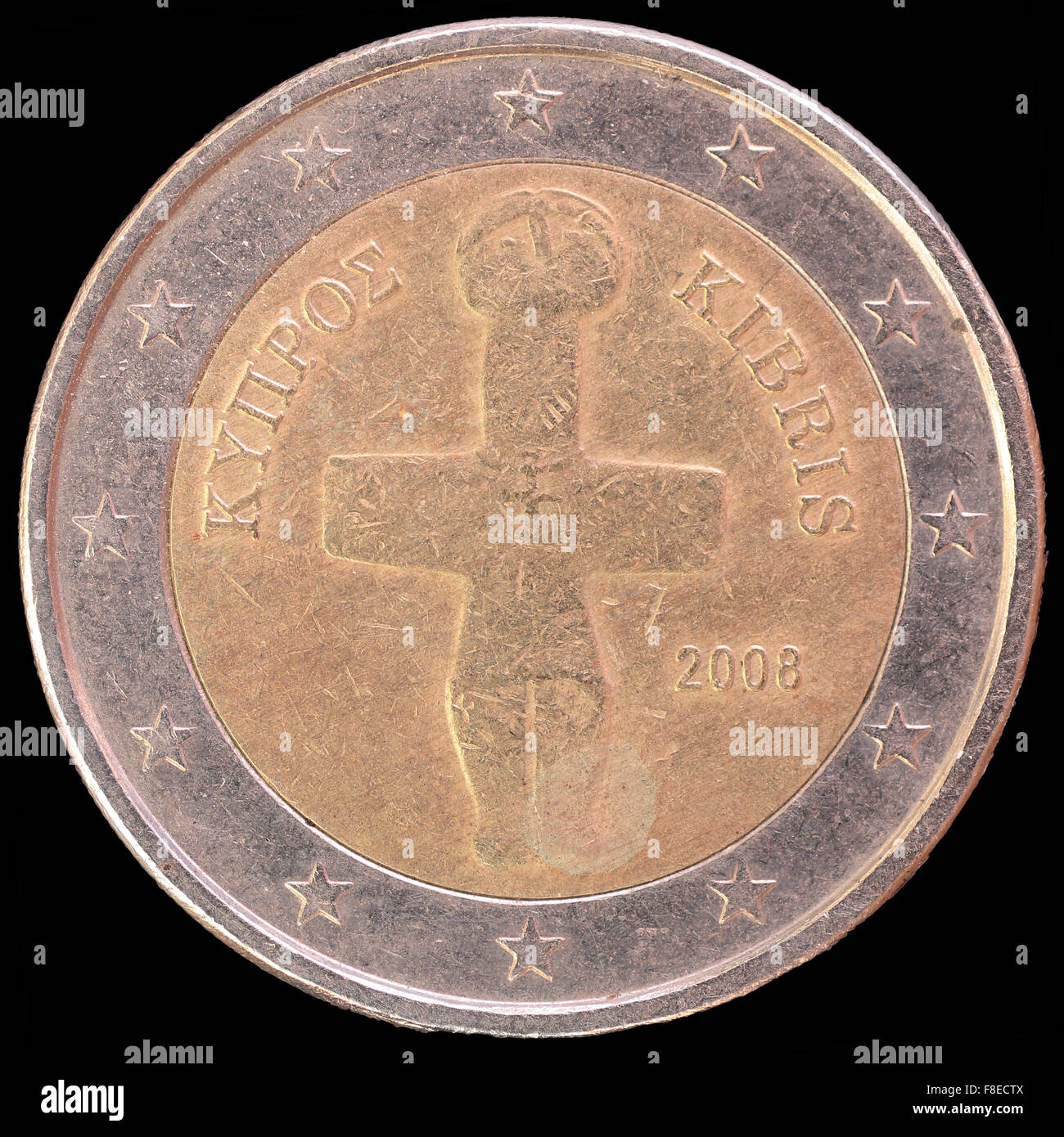 National side of two euro coin issued by Cyprus isolated on a black background. The cypriot obverse face depicts a cruciform ido Stock Photo