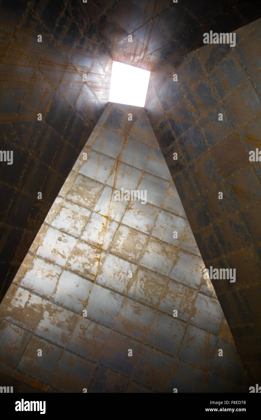 detail of hollow pyramid rusty metal light Stock Photo