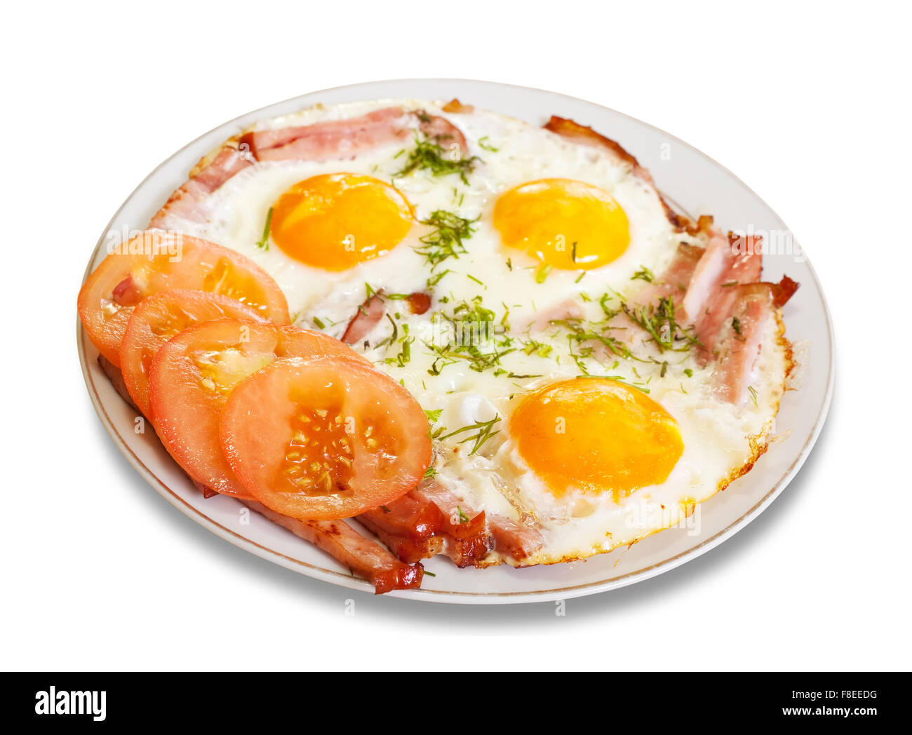 fried eggs with bacon on plate. Isolated over white Stock Photo - Alamy