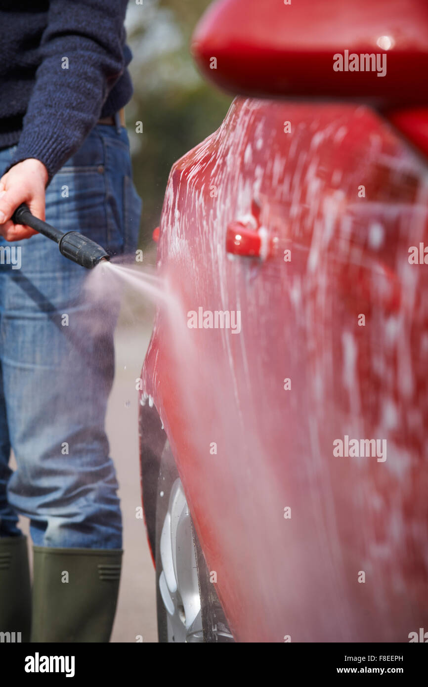 Man Washing Car With Pressure Washer Stock Photo Alamy