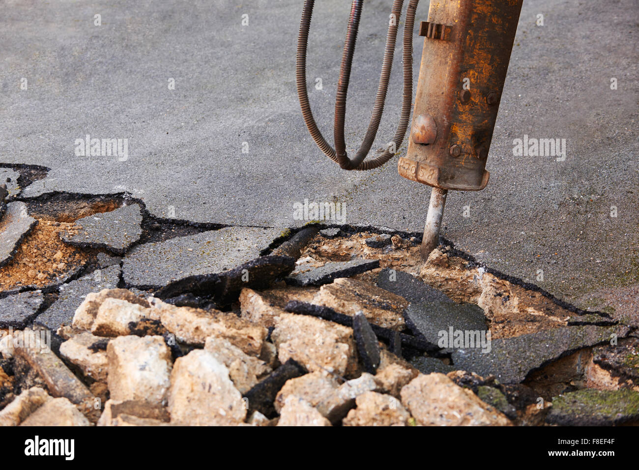Close Up Of Road Being Dug Up For Repair Stock Photo Alamy