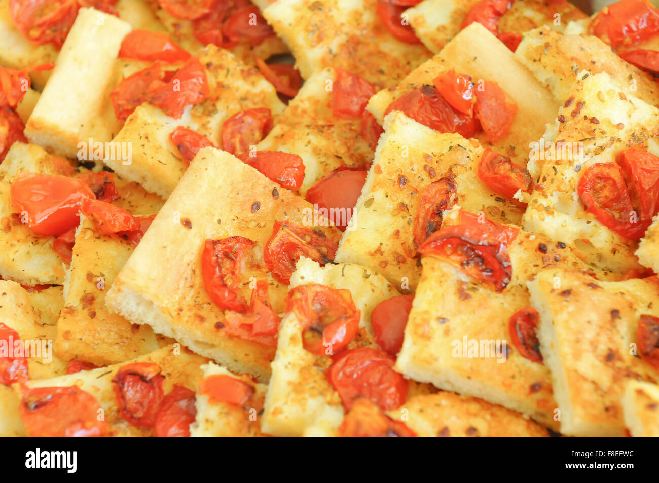 Slices of Pizza with cherry tomato, oil, oregano typical of Cilento