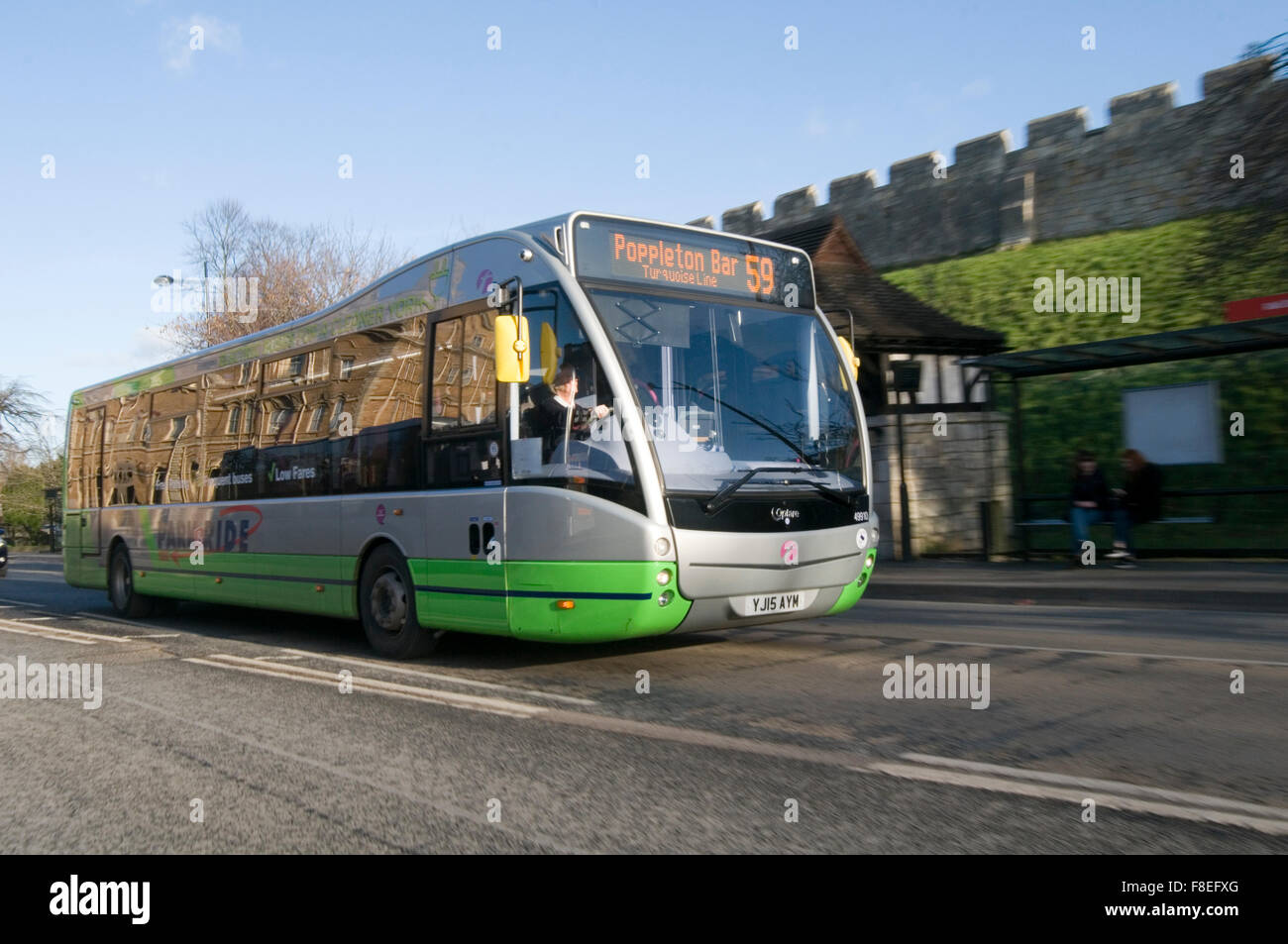 electric bus buses vehicle vehicles public transport system zero emissions emission green pollution solution air quality york uk Stock Photo