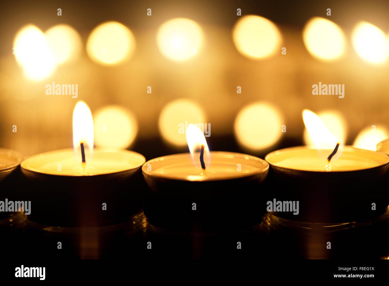 lots of candle in the dark Stock Photo Alamy