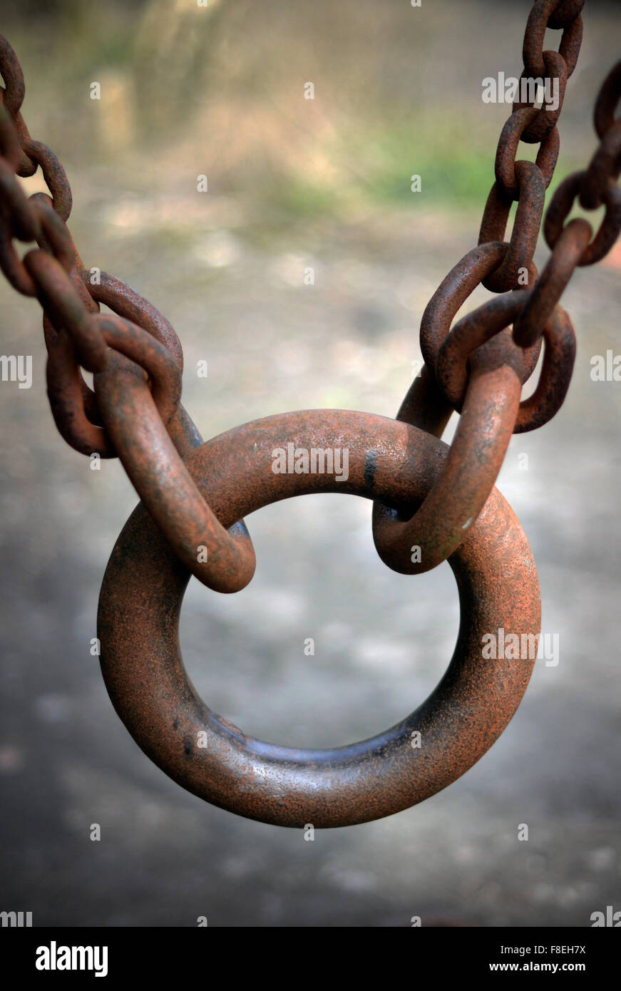 rusting chain and iron ring Stock Photo