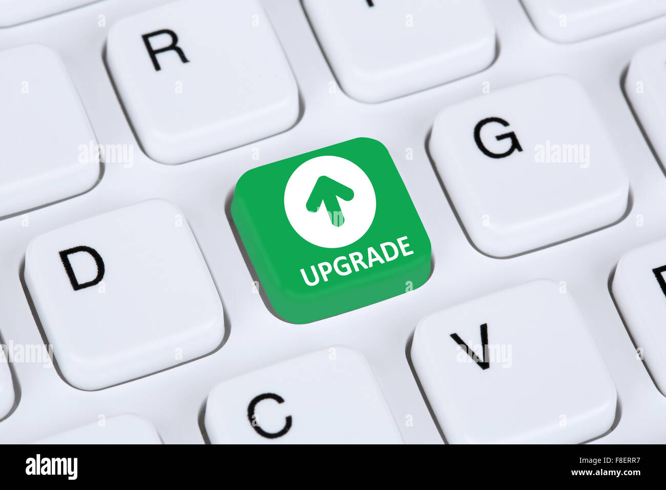 Upgrade upgrading software version program icon symbol on computer keyboard Stock Photo