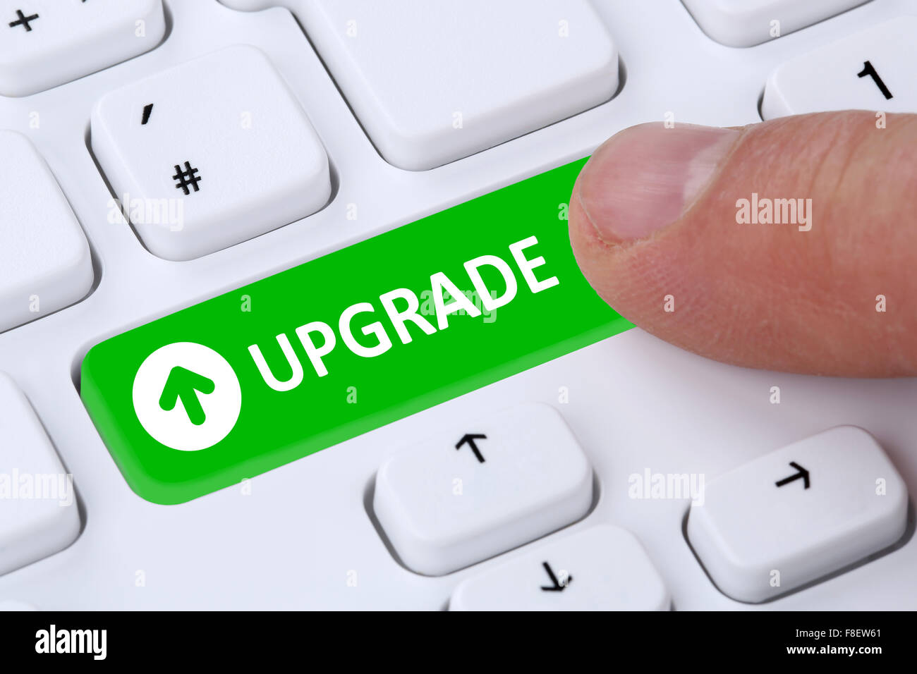 Upgrade upgrading software version program symbol on computer keyboard Stock Photo