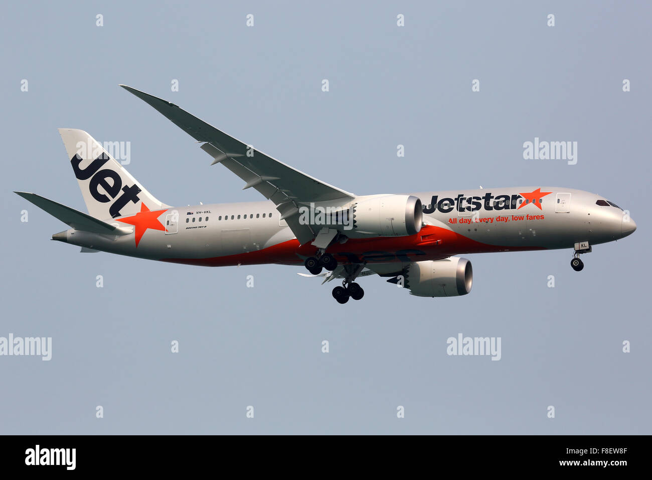 Singapore - October 21, 2015: A Jetstar Airways Boeing 787-8 Dreamliner with the registration VH-VKL approaches Singapore Changi Stock Photo
