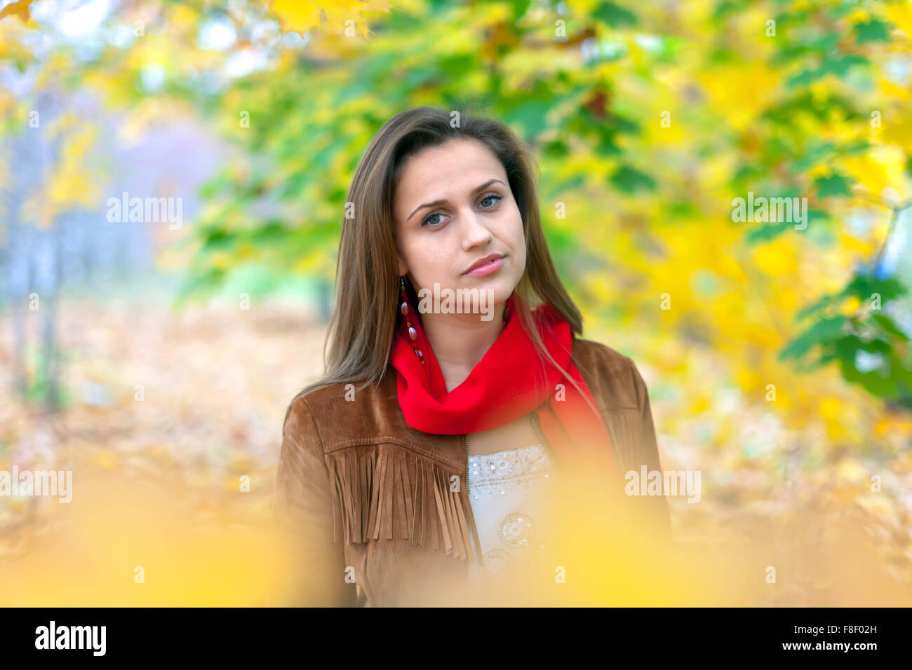 Portrait of beauty girl in autumn park Stock Photo - Alamy