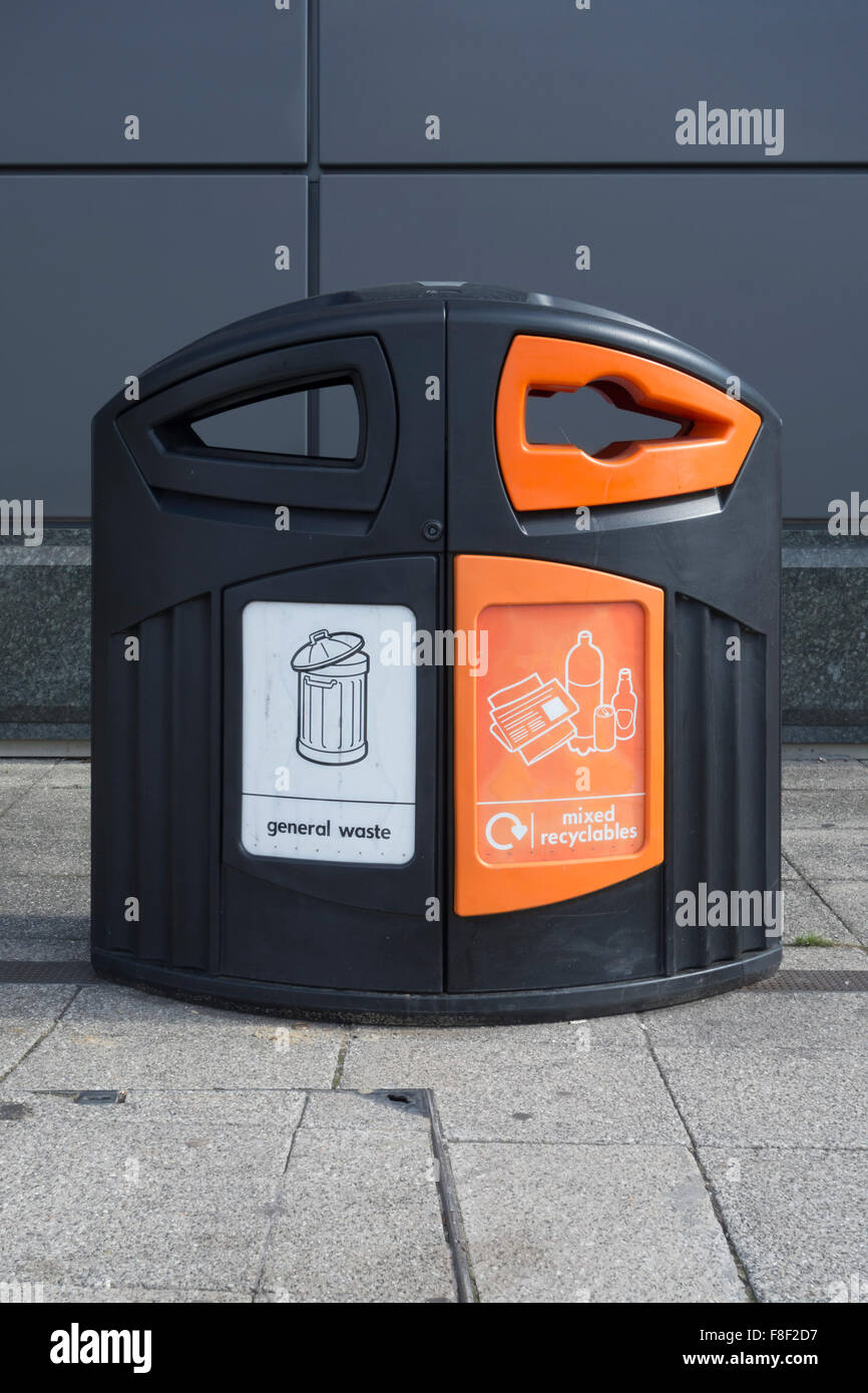 Street bin showing compartments for general waste and recyclable material Stock Photo