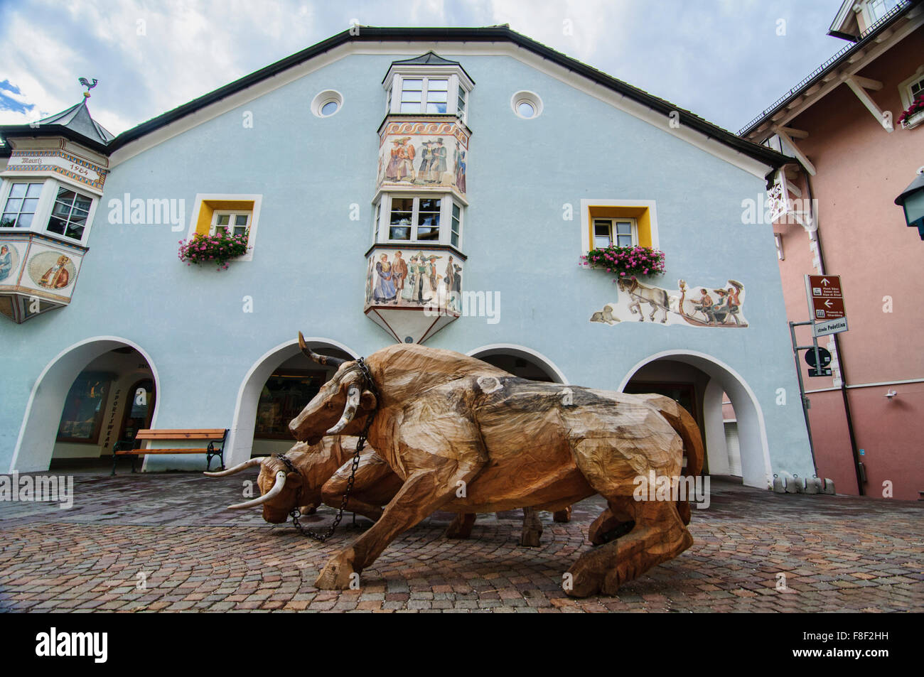 Bulls wood carvings in Ortisei (St. Ulrich) in the Dolomites, Italy