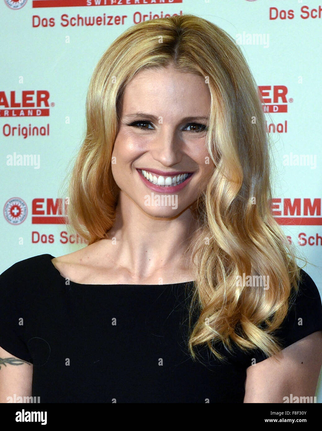 Cologne, Germany. 09th Dec, 2015. Moderator Michelle Hunziker during a photo shoot in Cologne, Germany, 09 December 2015. She has been crowned brand ambassador for Swiss cheese Emmentaler company AOP. Photo: HENNING KAISER/DPA/Alamy Live News Stock Photo