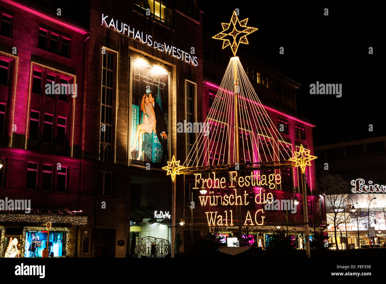 Kaufhaus des Westens and advertising for Wall AG at christmas time in Berlin Germany Stock Photo
