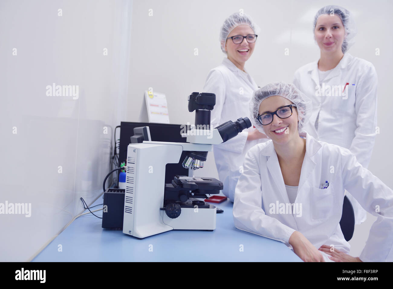 group of scientists working at the laboratory Stock Photo - Alamy