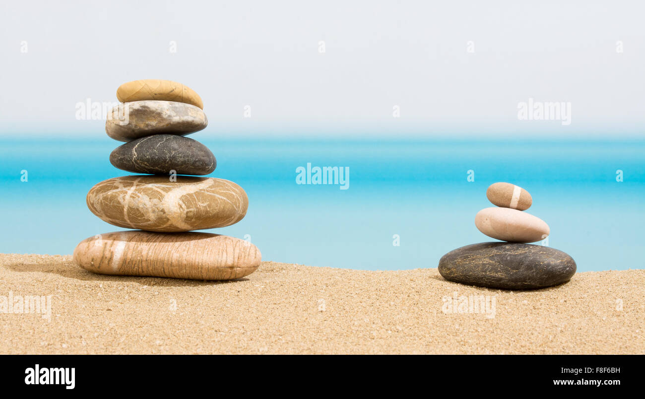 Relaxing on the beach, stack of stones. Stock Photo