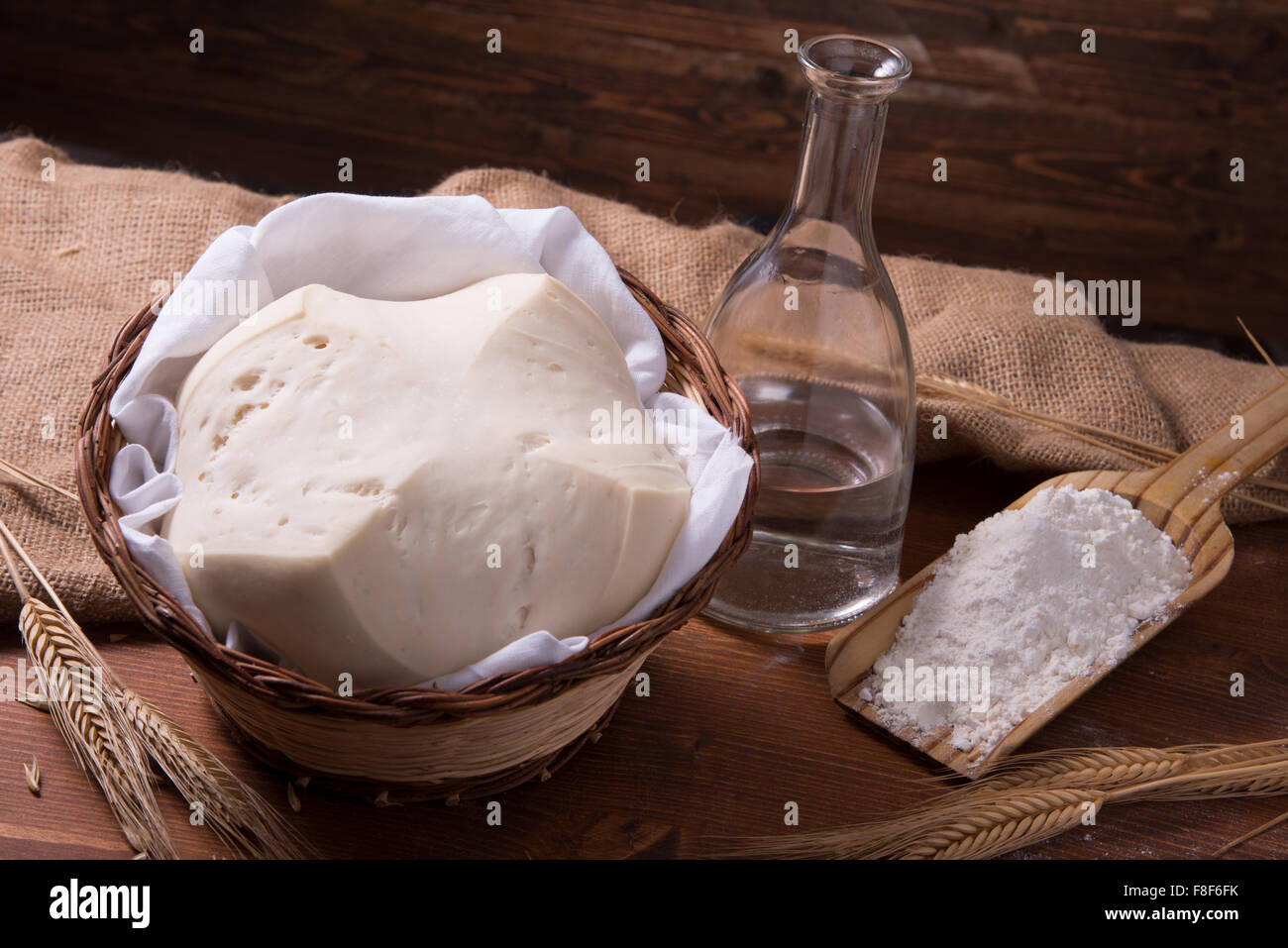 Mother Yeast, Natural Yeast on still life composition with flour and wheat Stock Photo