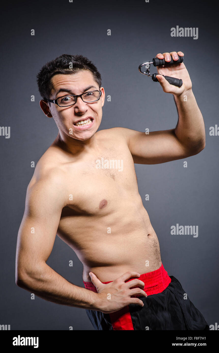 Young man trains isolated on white Stock Photo