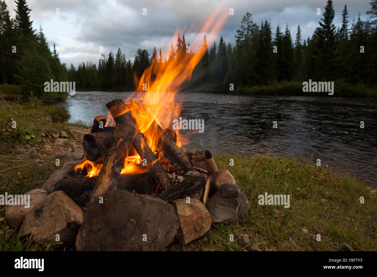 Fire, bonfire, campfire, camping, romantic, Lagerfeuer, Feuer, Outdoor, Feuerstelle, Campen, Schweden, Skandinavien, romantisch Stock Photo