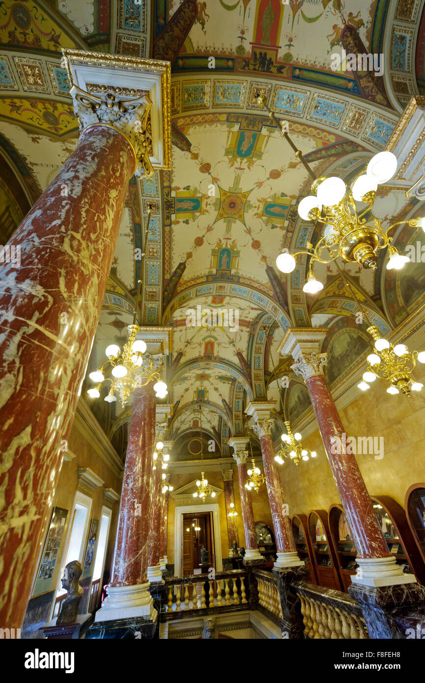 The beautiful interior with marble pillars and decorated ceiling at the Hungarian State Opera House in Budapest, Hungary. Stock Photo