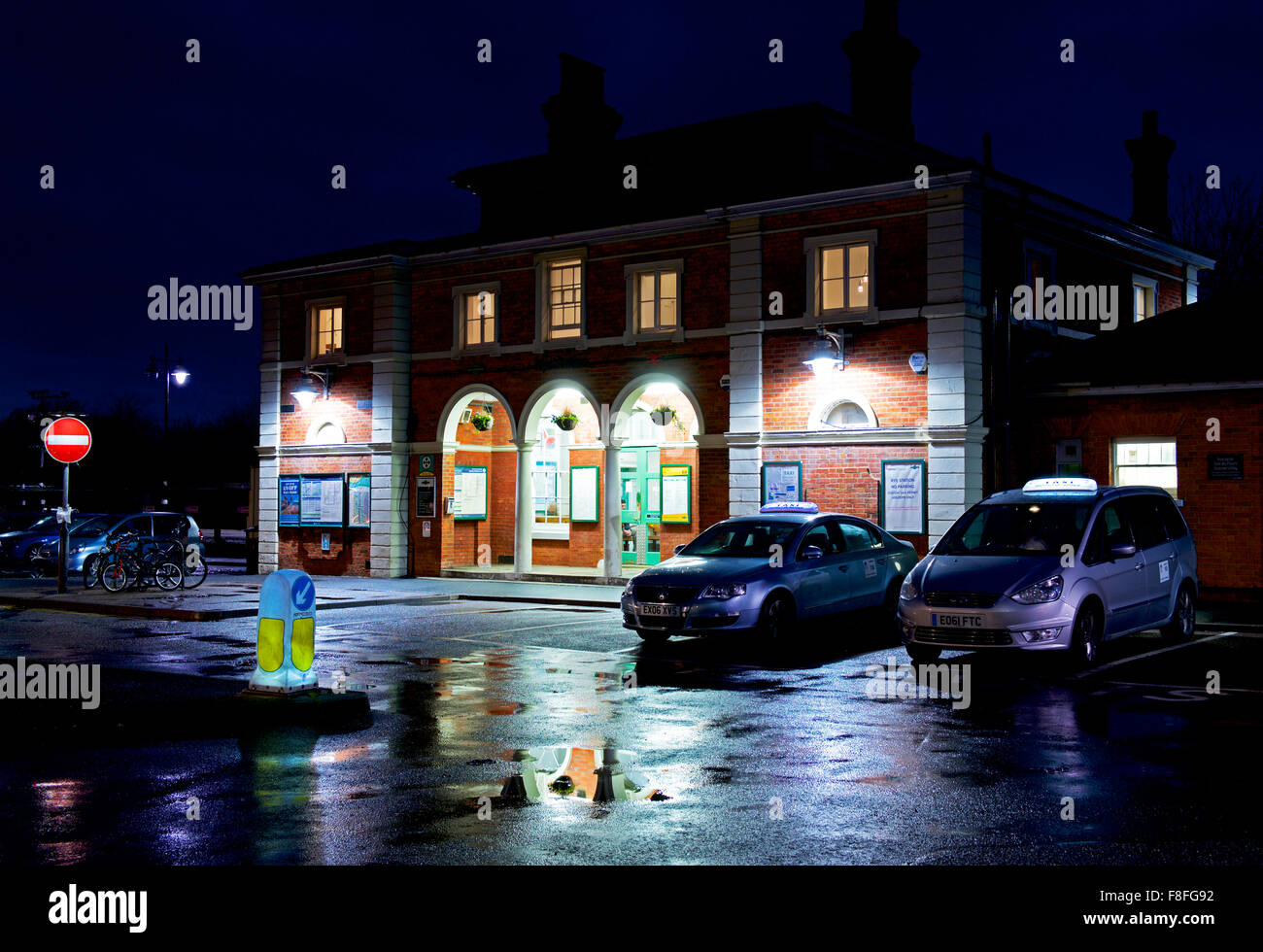 The railway station at night, Rye, East Sussex, England UK Stock Photo