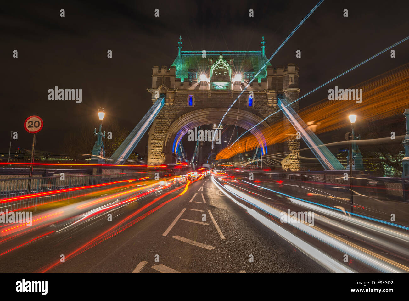 Traffic light trails on Tower Bridge in London at night Stock Photo - Alamy