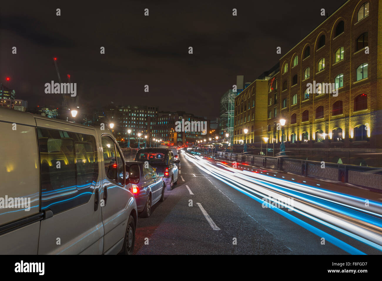 Traffic light trails in central London at night Stock Photo
