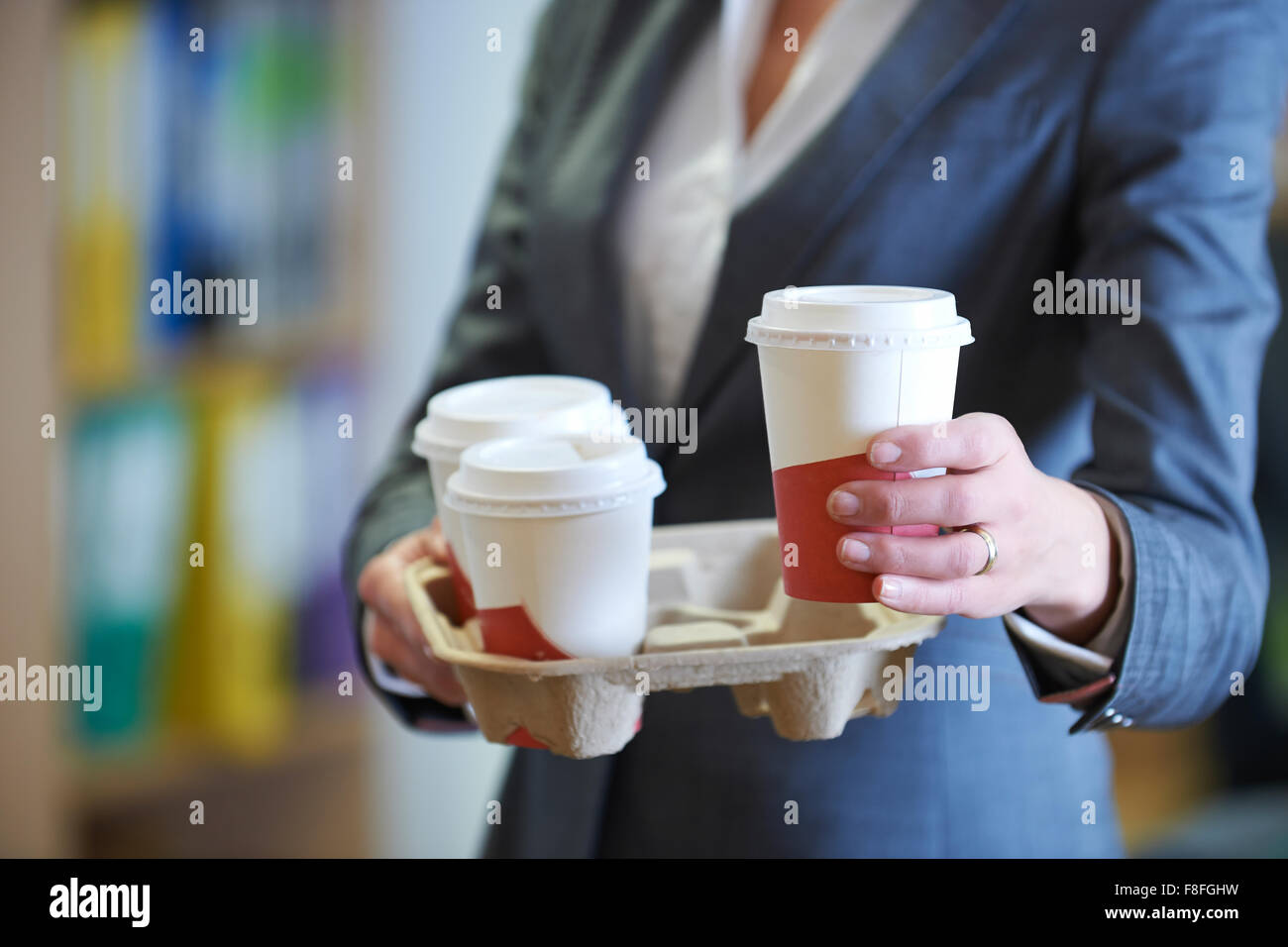 Businesswoman With Takeaway Coffee Stock Photo