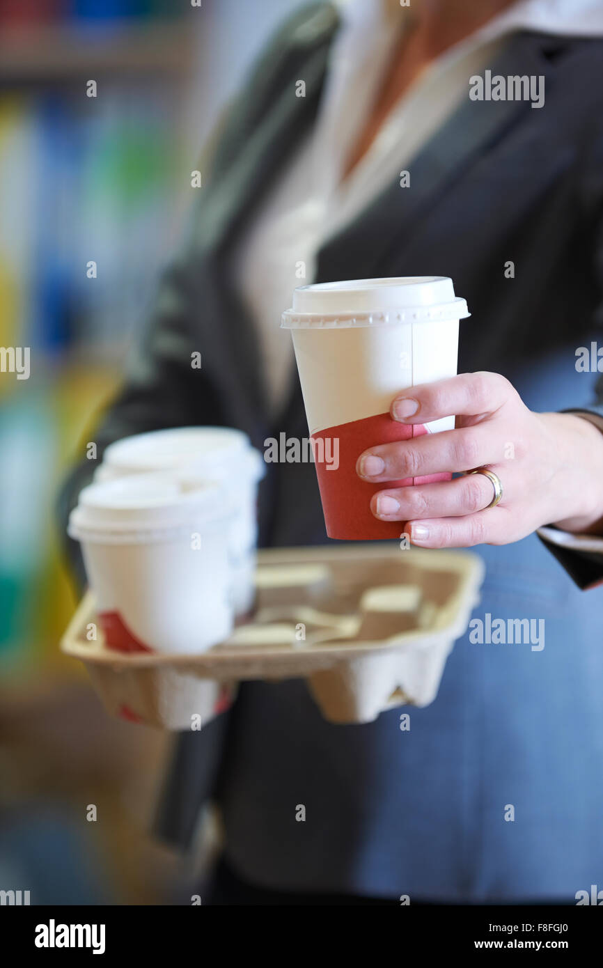 Businesswoman With Takeaway Coffee Stock Photo