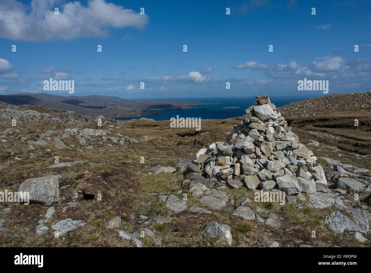 Cairn at 285m on the hill track to Rhenigidale on Harris Stock Photo