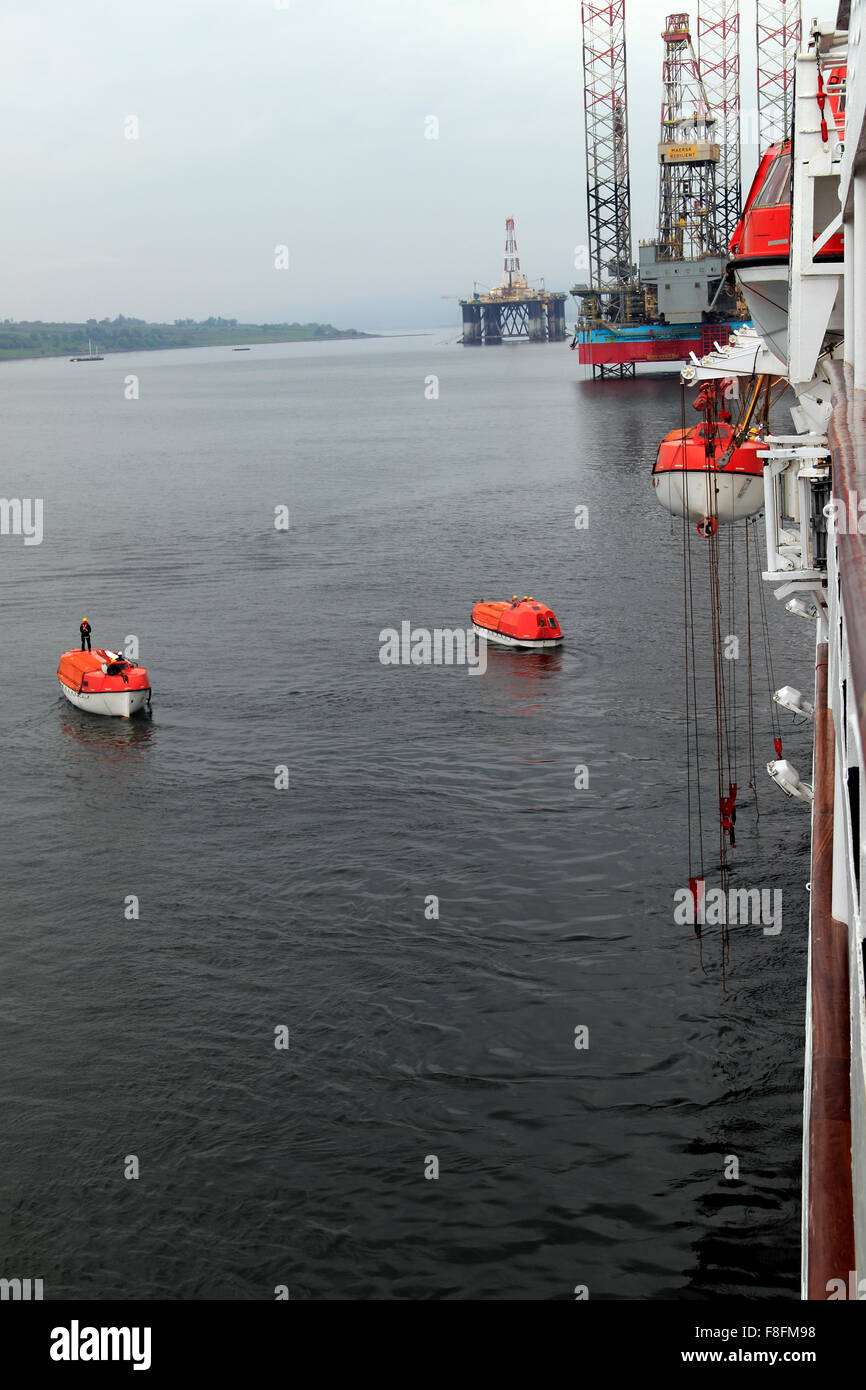 Cruise ship crew lifeboat drill Invergordon Highland Scotland UK Stock Photo