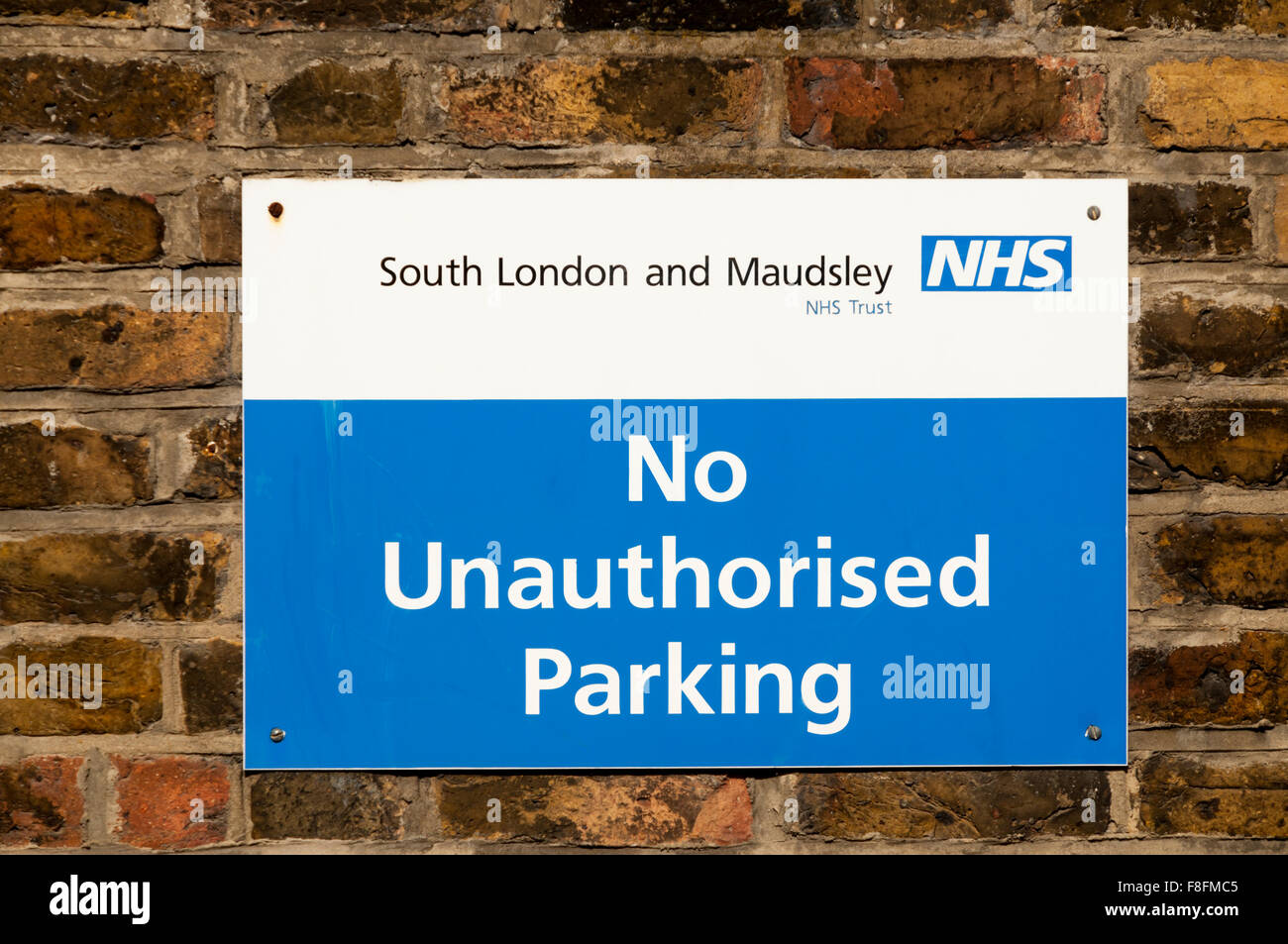 South London and Maudsley NHS Trus No Unauthorised Parking sign. Stock Photo
