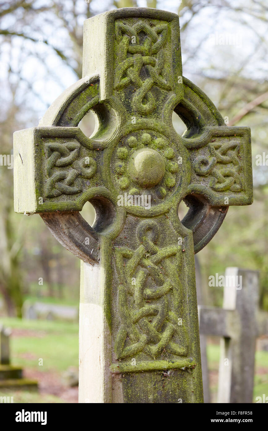 Decorative stone cross gravestone in Church Cemetery, Nottingham, England, UK. Stock Photo