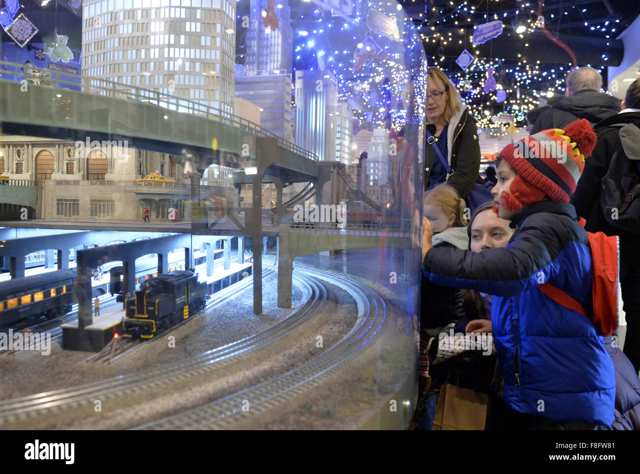 New York, USA. 9th Dec, 2015. Visitors watch a model railroad presented