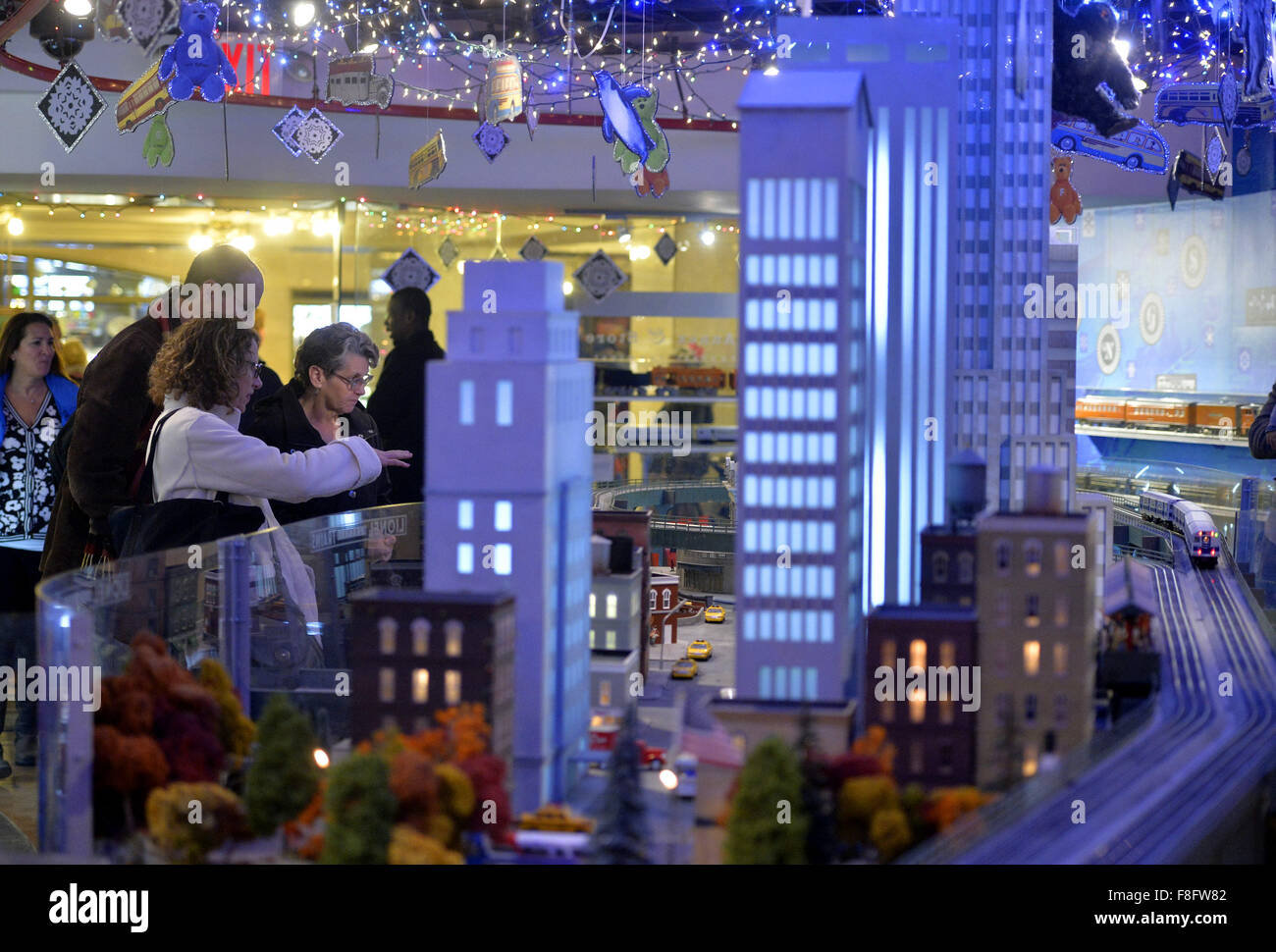 New York, USA. 9th Dec, 2015. Visitors watch a model railroad presented