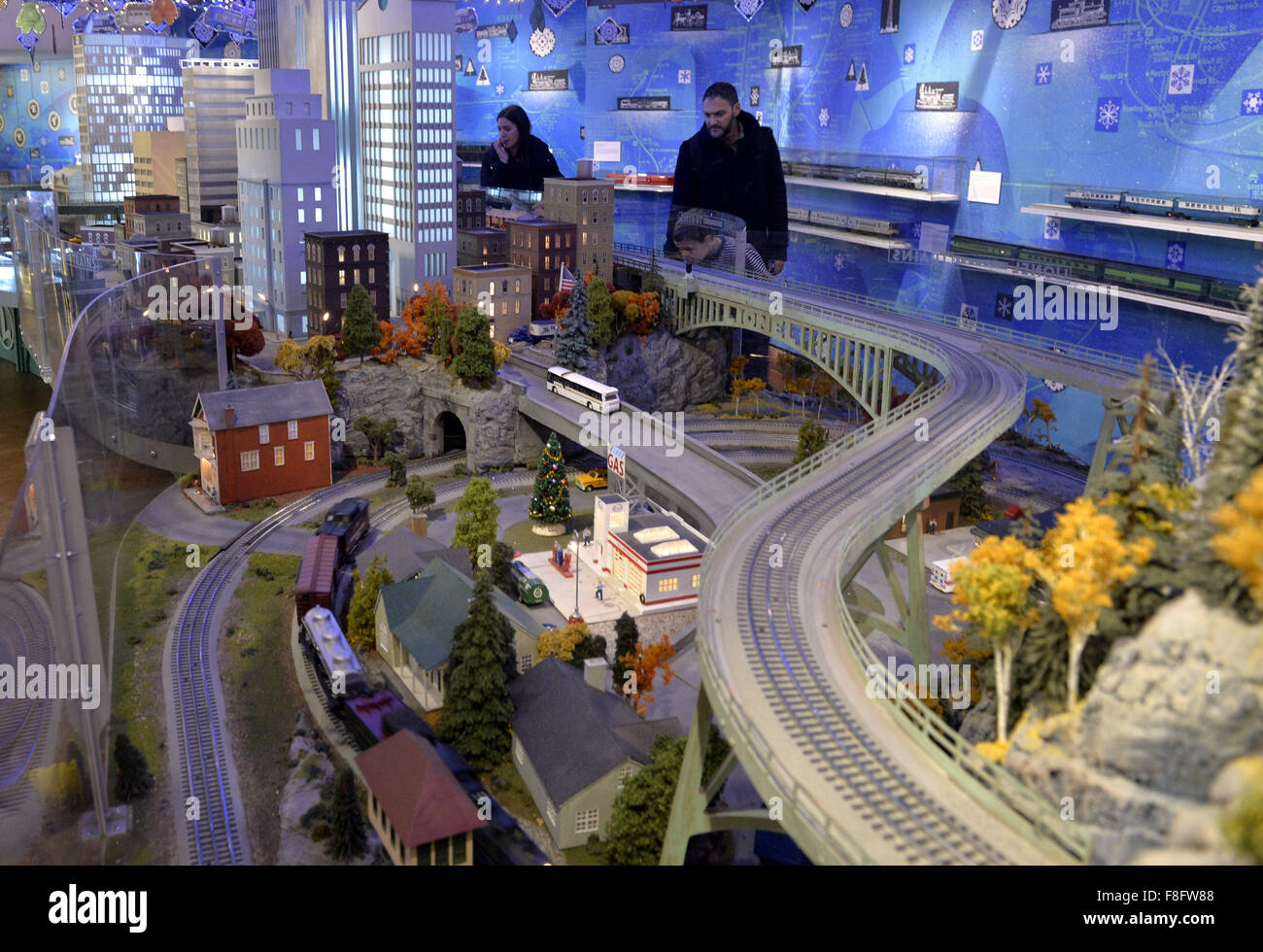 New York, USA. 9th Dec, 2015. Visitors watch a model railroad presented