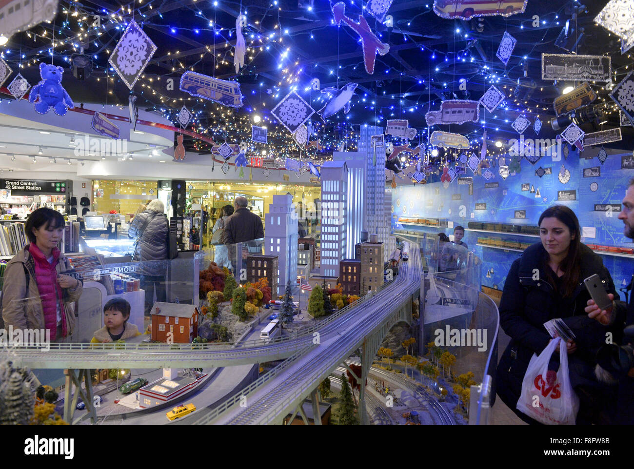 New York, USA. 9th Dec, 2015. Visitors watch a model railroad presented