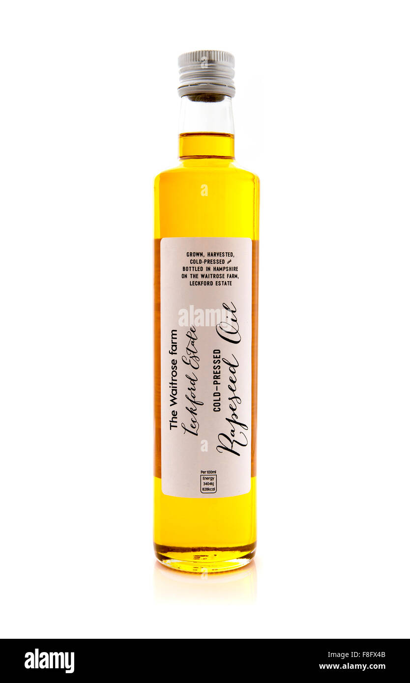 Bottle Of Waitrose Farm Cold Pressed Rapeseed Oil on a White Background Stock Photo