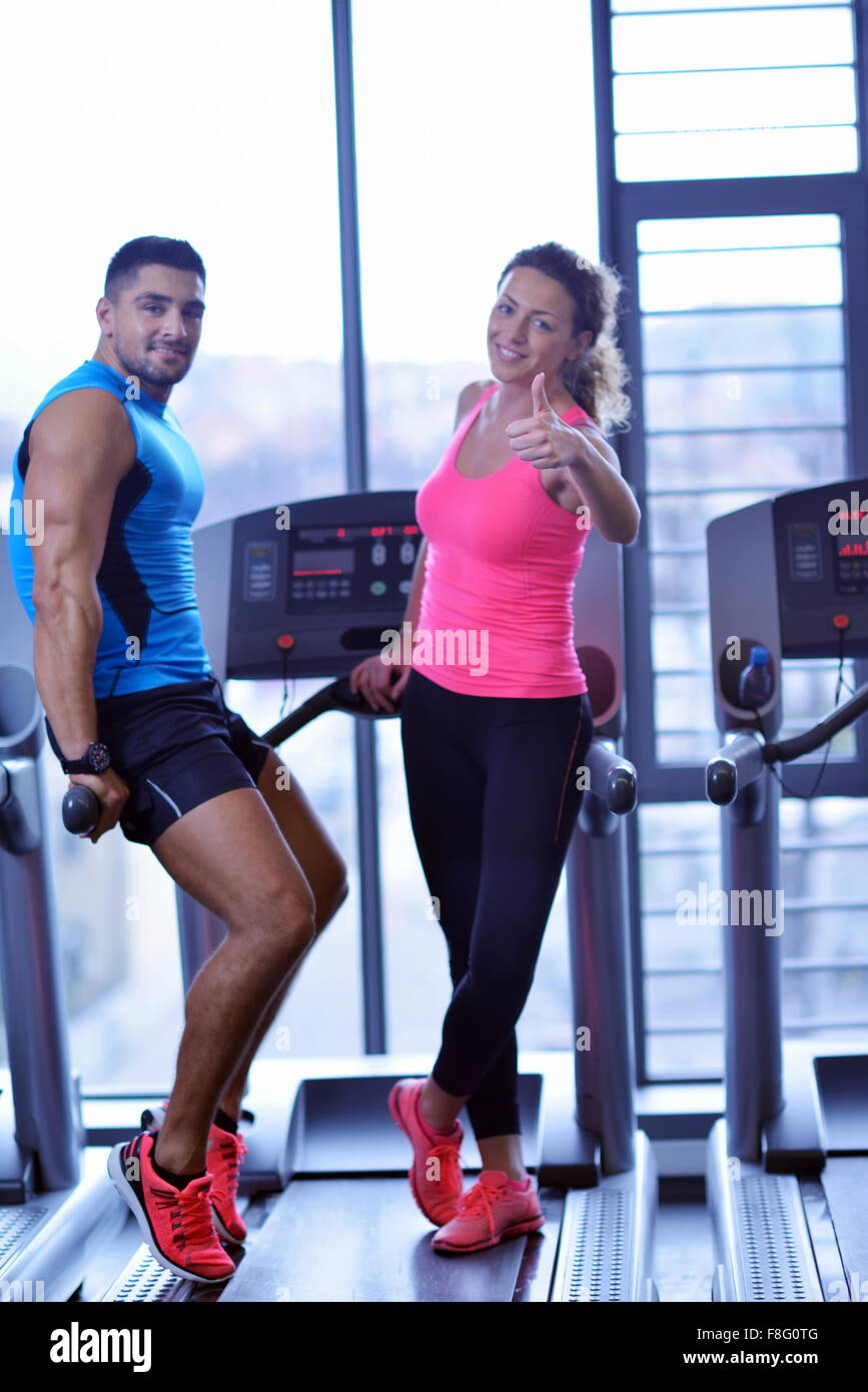 attractive couple at the gym looking happy Stock Photo - Alamy