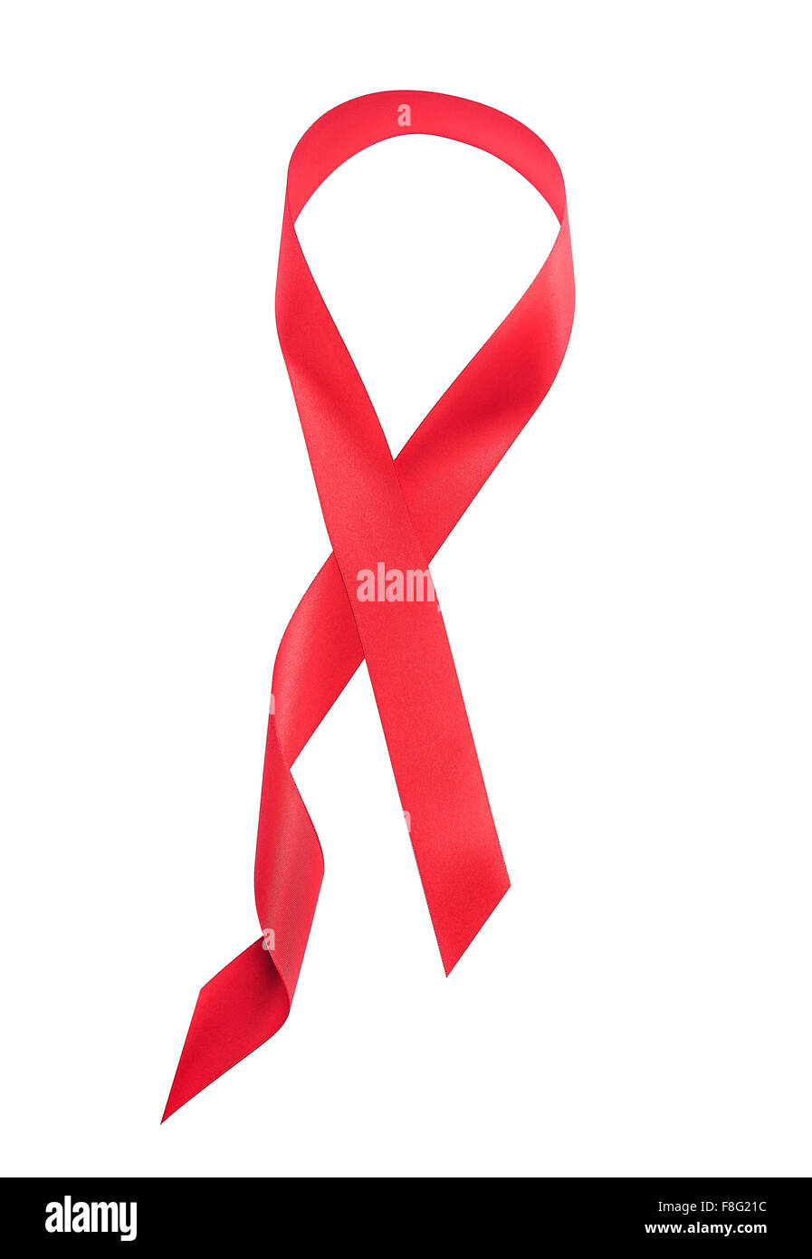 Red ribbon, the symbol of AIDS. Stock Photo