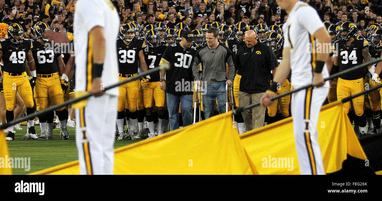 Iowa City, Iowa, USA. 19th Sep, 2015. With the help of former teammate Pat Angerer (L), Brett Greenwood leads the Swarm out of the tunnel, Saturday, September 19, 2015, before the start of the Pittsburgh game at Kinnick Stadium in Iowa City. © John Schultz/Quad-City Times/ZUMA Wire/Alamy Live News Stock Photo